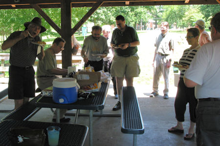 picnickers gravitate to shade for food and conversation