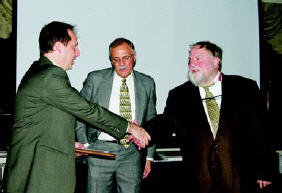 John Baldus receiving award