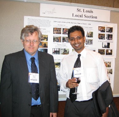 Keith Stine and Arindam Roy with activities poster