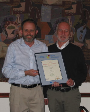Greg Wall receives Salute to Excellence from Jeff Cornelius
